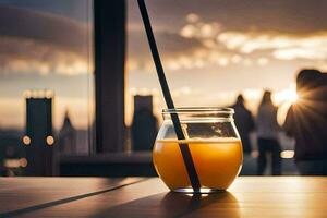 une verre de Orange jus sur une table avec une paille. généré par ai photo
