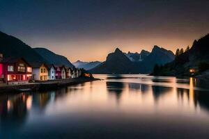 coloré Maisons sur le rive de une Lac à le coucher du soleil. généré par ai photo