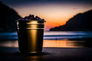 une seau de les raisins sur le plage à le coucher du soleil. généré par ai photo