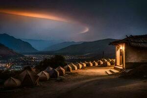 une petit village avec tentes et une lumière brillant dans le ciel. généré par ai photo