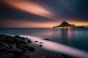 une longue exposition photographier de une Montagne et océan à le coucher du soleil. généré par ai photo