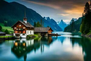 une maison est assis sur le bord de une Lac à le coucher du soleil. généré par ai photo