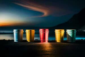 coloré tasses sur le plage à le coucher du soleil. généré par ai photo