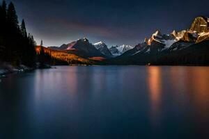 le montagnes sont réfléchi dans le l'eau à le coucher du soleil. généré par ai photo