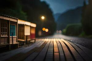 une miniature train est sur une Piste à nuit. généré par ai photo