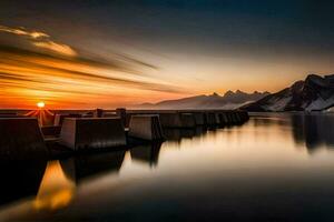 le Soleil ensembles plus de une Lac et montagnes. généré par ai photo