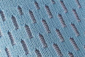 fragment de une bleu en tissu espadrille. le texture de le Matériel de des sports des chaussures photo