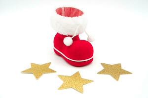 Père Noël chaussure et or étoile isolé sur blanc Contexte. Noël Contexte. photo