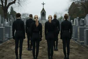 une groupe de Jeune gens dans une cimetière à la recherche à le pierres tombales ai généré photo