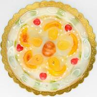 une gâteau avec fruit sur il, cassata sicilienne, typique italien nourriture.. photo