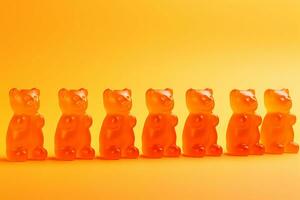 ai génératif. Orange parfumé immunitaire gommeux ours pour les enfants sont doublé en haut sur un Orange Contexte. diététique supplément photo