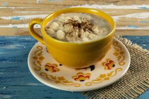 tasse de Canjica, typique nourriture consommé dans le brésilien festa juninas photo