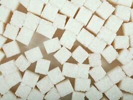 blanc sucre cubes sur une en bois surface, Contexte photo