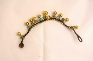 une or et turquoise bracelet avec perles photo