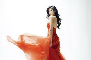 portrait de un asiatique femme dans une branché robe frappant une pose. ai généré photo