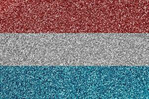 Luxembourg drapeau représenté sur beaucoup petit brillant paillettes. coloré Festival Contexte pour fête photo