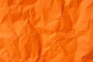 Orange froissé papier texture utilisé pour papier Contexte texture dans décoratif art travail photo