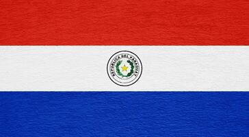 drapeau de république de paraguay sur une texturé Contexte. concept collage. photo