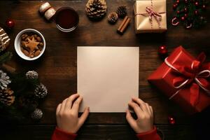 plat allonger de enfant mains l'écriture lettre à Père Noël claus sur en bois bureau avec copie espace. ai généré photo