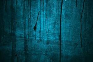 bleu mur effrayant texture pour Contexte. foncé bleu fissuré ciment photo