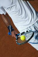 tennis joueur en portant une tennis raquette photo