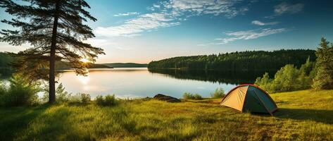 ai généré camping tente sur le rive de une Lac à le coucher du soleil. photo