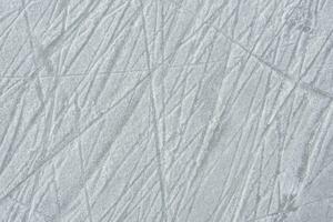 traces sur le la glace de patins sur le patinoire photo