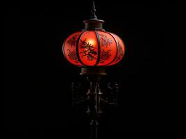 ai généré rouge et or chinois lanternes isolé sur noir Contexte. asiatique Nouveau année rouge les lampes Festival ai génératif photo