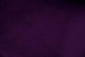 foncé violet velours en tissu texture utilisé comme Contexte. violet Couleur panne en tissu Contexte de doux et lisse textile matériel. écrasé velours .luxe magenta Ton pour soie. photo