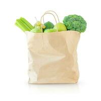 achats sac avec vert fruit et des légumes photo