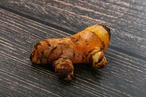 Frais curcuma racine pour cuisine photo