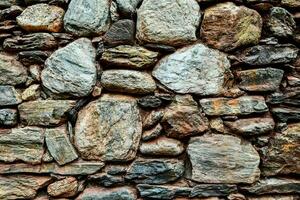 une mur fabriqué de rochers et des pierres photo