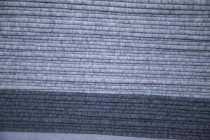 empilés plié gris en tissu surface texture Contexte fond d'écran photo