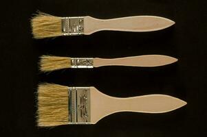 Trois peindre brosses cette sont différent tailles photo