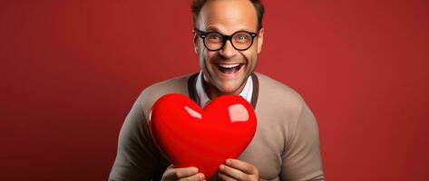 ai généré portrait de une content homme avec une rouge cœur sur la Saint-Valentin journée concept. photo