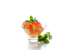 coloré sucré fruit gelée dans une verre verre photo