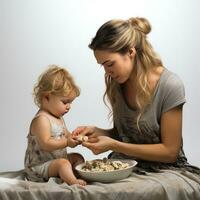 ai généré Jeune fille alimentation une petit bébé isolé photo