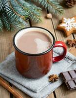 ai généré chaud cacao boisson dans marron agresser avec cannelle, bonbons, Noël hiver humeur, sur en bois table photo