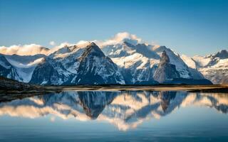 ai généré majestueux hiver pays des merveilles, panoramique sérénité avec congelé Lac et enneigé montagnes photo