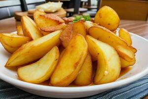 ai généré traditionnel Espagnol frit patates. pro photo