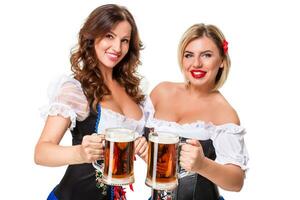 deux magnifique blond et brunette les filles de oktoberfest Bière Stein photo