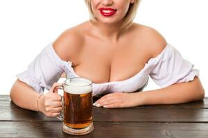 magnifique Jeune blond fille de oktoberfest Bière Stein photo