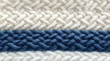 ai généré macro la photographie de le texture de une tricoté modèle dans fermer, blanc et bleu couleurs photo