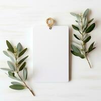 ai généré blanc Vide étiquette avec Vide de face réaliste sur une maquette modèle dans une blanc en bois table avec olive feuille branche photo