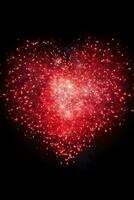 ai généré photo de feux d'artifice dans le forme de une cœur, idéal pour la Saint-Valentin journée ou lié au mariage promotions