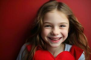 ai généré portrait de une mignonne peu fille avec rouge cœur sur valentines journée concept. photo