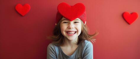 ai généré portrait de une mignonne peu fille avec rouge cœur sur valentines journée concept. photo