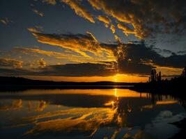 ai généré un image de une vibrant le coucher du soleil plus de une serein lac, avec coloré reflets chatoyant sur le l'eau avec neige photo