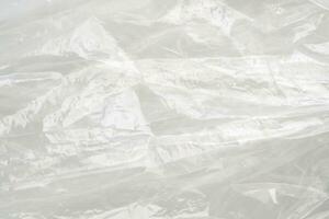 texture de sac en plastique transparent sur fond blanc photo