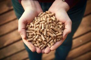 ai généré Masculin mains en portant bois pellets. écologique carburant fabriqué de biomasse. renouvelable énergie source. photo